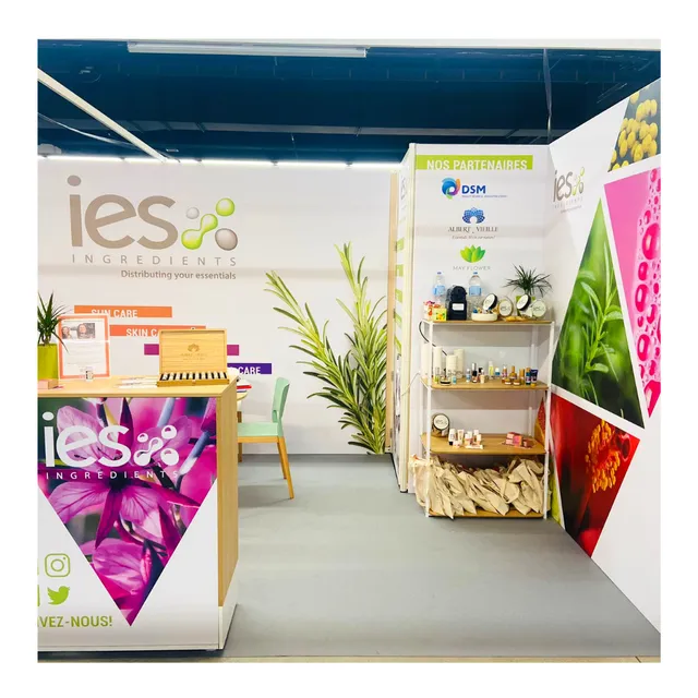 IES Ingredients exhibition booth with natural ingredient displays and modern reception area