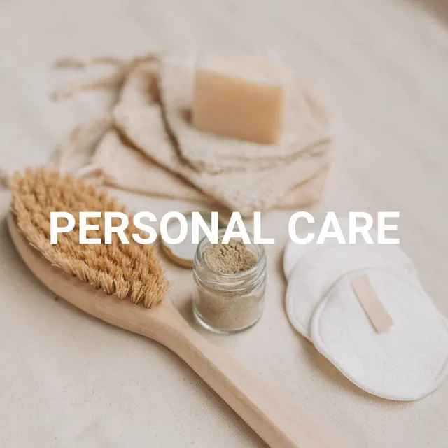 Natural personal care products - brush, soap, powder and beige accessories on a neutral background